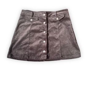 Black mini skirt that’s button up down the front
